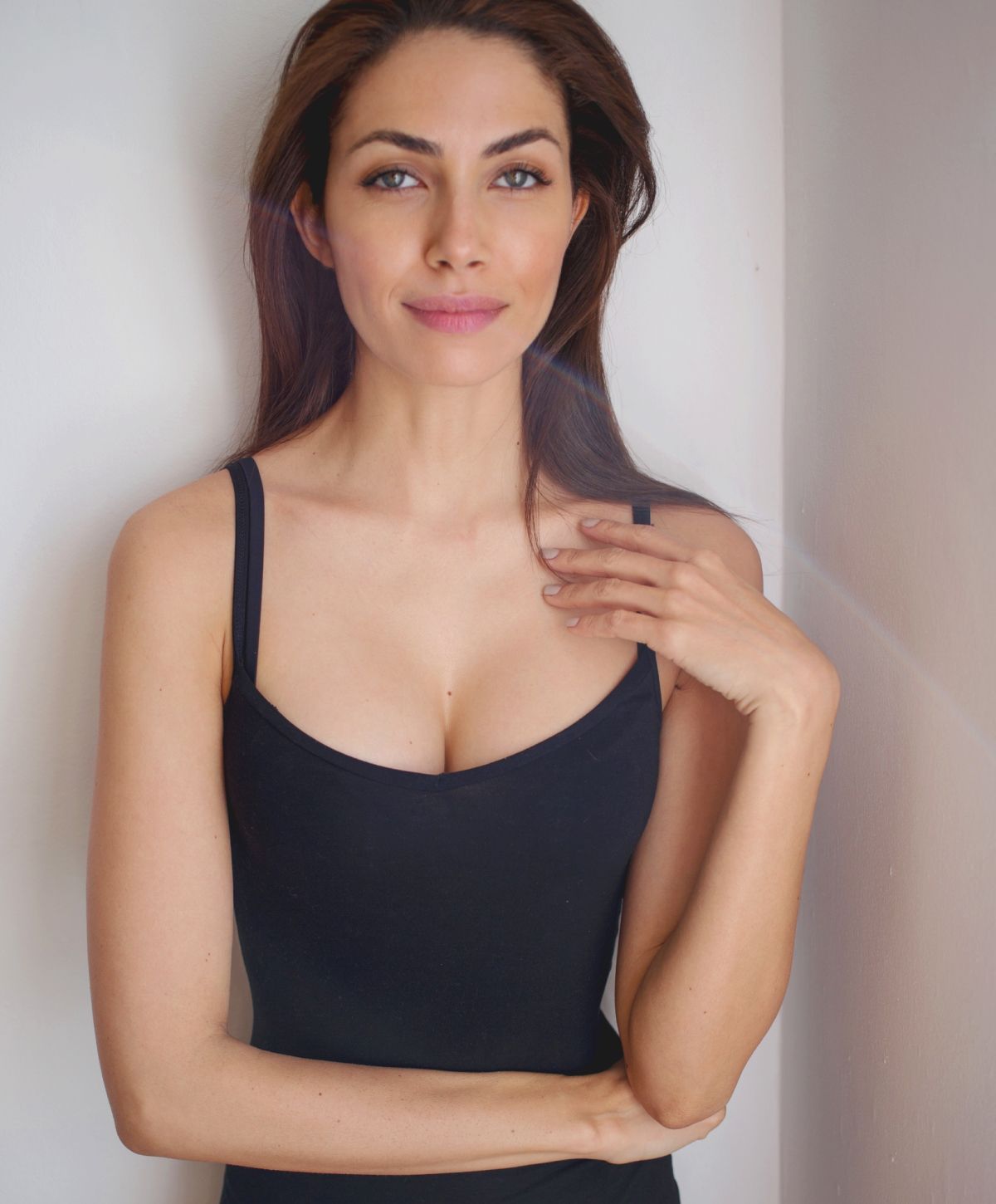Pittsburgh Breast Lift model wearing black