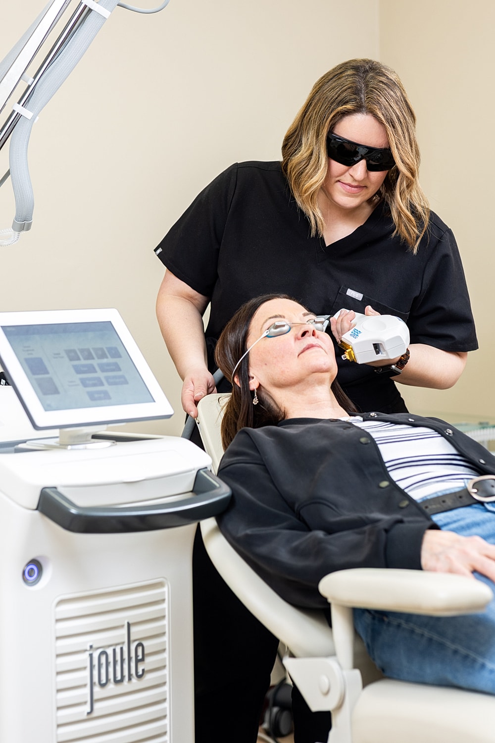 Laser treatment session at a skincare clinic.
