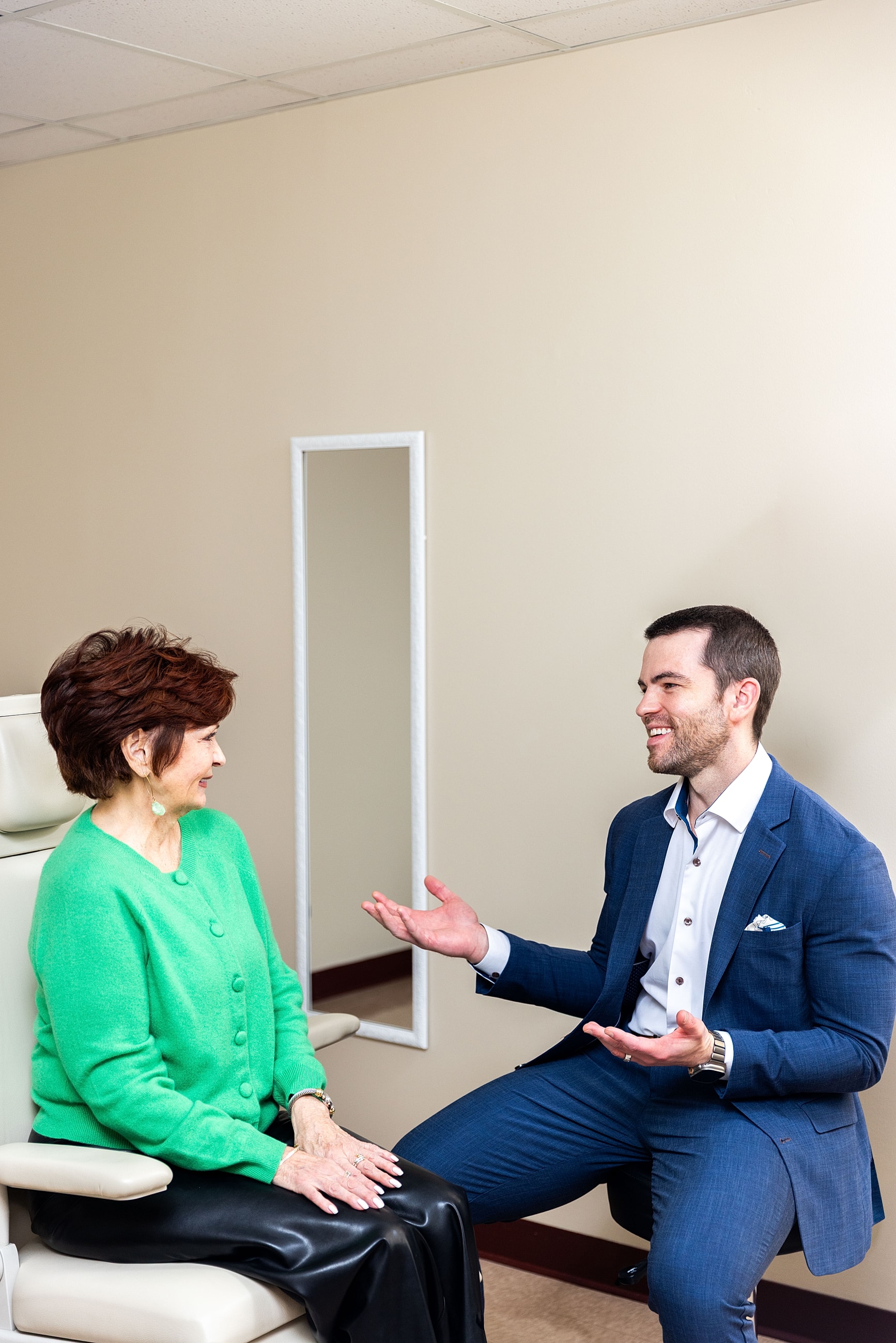 Patient consult with doctor in office setting.